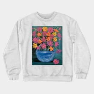 A beautiful bouquet of mixed flowers in a glass vase Crewneck Sweatshirt